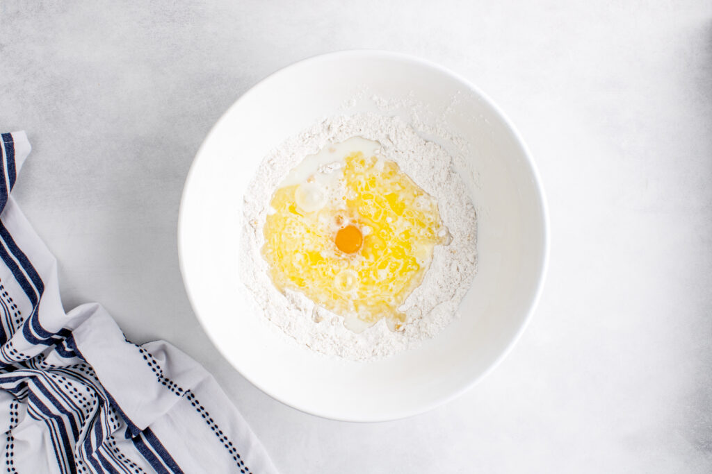 egg in a bowl of flour